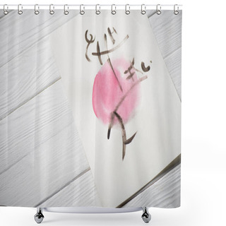 Personality  High Angle View Of Paper With Japanese Painting With Hieroglyphs On Pink Circle On Wooden Background Shower Curtains