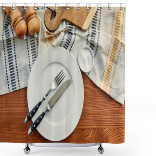 Personality  Top View Of Plate With Fork And Knife Near Napkin With Cutting Board, Pepper And Salt Mills On Wooden Background Shower Curtains