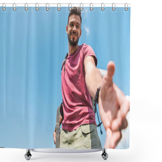 Personality  Bottom View Of Handsome Young Tourist Stretching Out Hand, Blue Sky On Background Shower Curtains