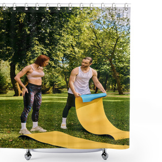 Personality  A Man And A Woman In Sportswear Enjoy A Playful Moment On A Slide In A Park, Filled With Determination And Motivation. Shower Curtains