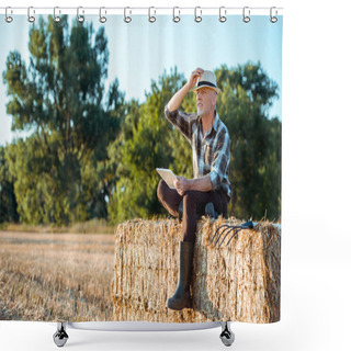 Personality  Senior Farmer Using Digital Tablet While Sitting On Bale Of Hay  Shower Curtains