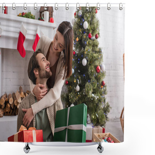 Personality  Pleased Woman Embracing Husband Holding Gift Boxes Near Fireplace And Christmas Tree Shower Curtains