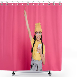 Personality  Happy Girl In Beanie Hat And Glasses Using Smartphone On Pink Background, Stylish Look, Pointing Up Shower Curtains