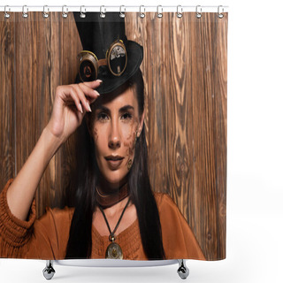 Personality  Front View Of Steampunk Woman Touching Top Hat With Goggles Looking At Camera On Wooden Shower Curtains