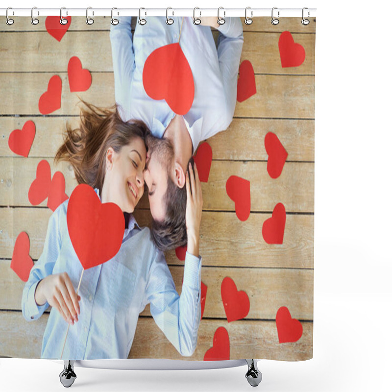 Personality  Couple lying on the wooden floor with hearts view from above. shower curtains