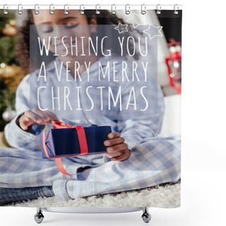 Personality  Selective Focus Of Smiling Adorable African American Child In Pajamas Opening Christmas Gift At Home With 