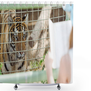 Personality  Selective Focus Of Tiger In Cage Near Kid Holding Book In Zoo  Shower Curtains