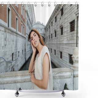 Personality  Young Woman With Hand Near Fence Looking At Camera Near Medieval Prison In Venice Shower Curtains