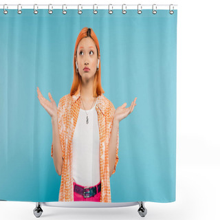 Personality  Young And Discouraged Asian Woman In Orange Shirt, With Dyed Red Hair Listening Music In Wireless Earphone, Showing Shrug Gesture And Looking Up On Blue Background, Generation Z Shower Curtains