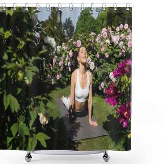 Personality  Positive Woman Practicing Cobra Pose On Yoga Mat Near Green Blossoming Plants Shower Curtains