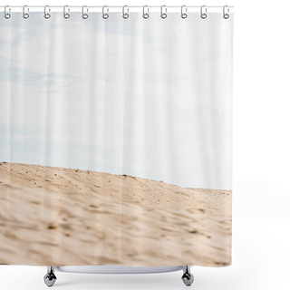 Personality  Selective Focus Of Wavy And Golden Sand Against Sky With Clouds In Desert  Shower Curtains