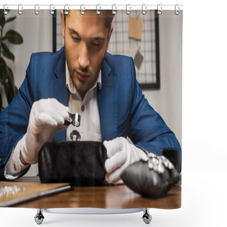 Personality  Handsome Jewelry Appraiser Holding Magnifying Glass While Examining Gemstone Near Earrings On Table Shower Curtains