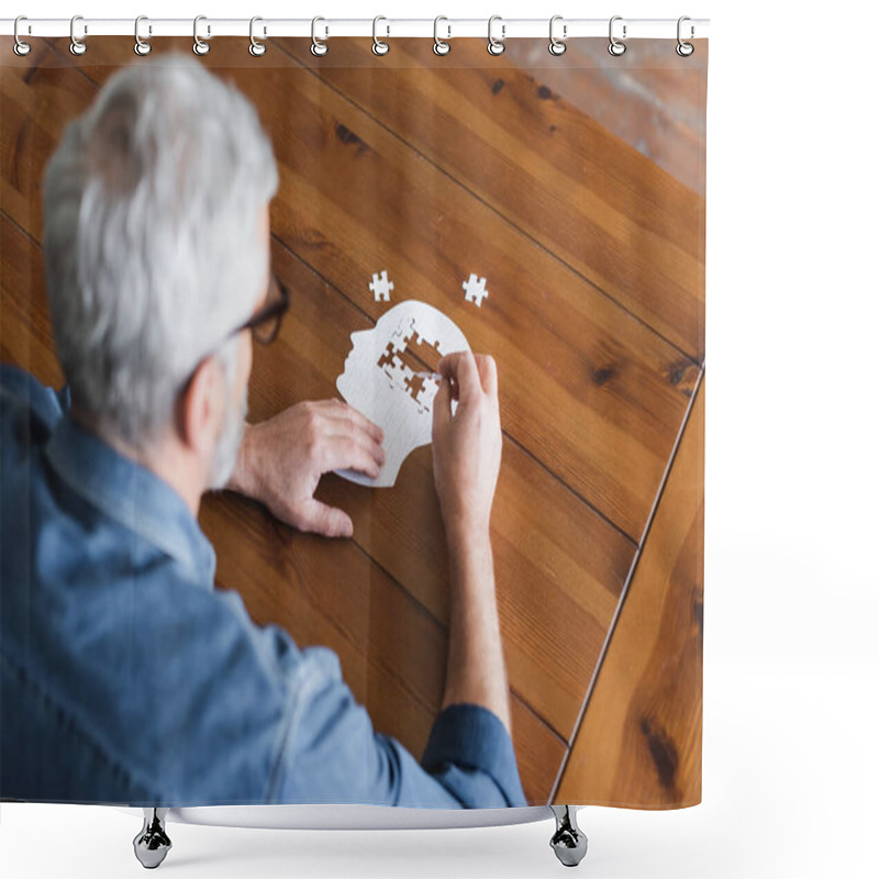 Personality  Overhead View Of Senior Man On Blurred Foreground Folding Puzzle On Table  Shower Curtains