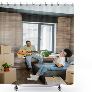 Personality  Happy African American Woman Holding Coffee Near Boyfriend Playing Acoustic Guitar In New House Shower Curtains