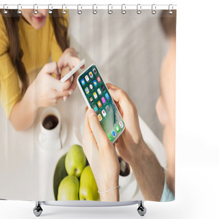 Personality  KYIV, UKRAINE - FEBRUARY 21, 2020: Selective Focus Of Man Using Smartphone With Iphone Screen Near Girlfriend During Breakfast  Shower Curtains