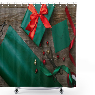 Personality  Top View Of Christmas Toys, Wrapped Present With Ribbon And Blank Envelope For Greeting Card On Wooden Background Shower Curtains