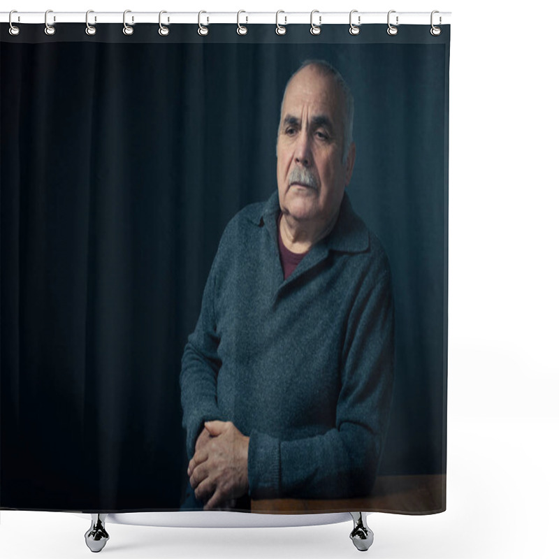 Personality  Serious middle aged man leaning on table shower curtains