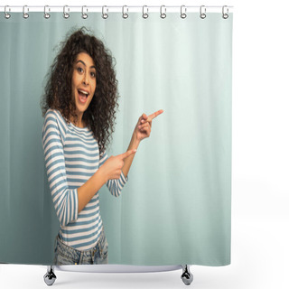 Personality  Excited Mixed Race Girl Looking At Camera While Pointing With Fingers On Grey Background Shower Curtains