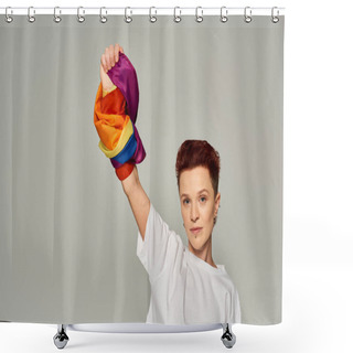 Personality  Confident Redhead Bigender Person In White T-shirt And Jeans Standing With LGBT Flag On Grey Shower Curtains