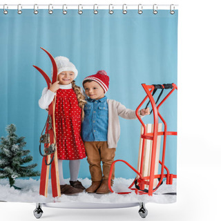 Personality  Children In Winter Outfit Holding Skis And Sleight While Standing On Snow Isolated On Blue  Shower Curtains