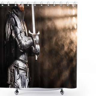Personality  Cropped View Of Knight In Armor Holding Sword On Black Background Shower Curtains