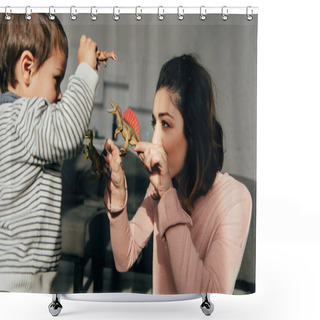 Personality  Selective Focus Of Mother And Little Son Playing Toy Dinosaurs In Living Room At Home Shower Curtains