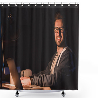 Personality  Handsome Young Programmer In Eyeglasses Smiling At Camera While Working With Laptop And Desktop Computer At Night Time Shower Curtains