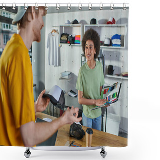 Personality  Smiling Young African American Designer Holding Cloth Samples Near Blurred Colleague With Snapback And Laptop With Blank Screen In Print Studio, Hands-on Entrepreneurship Concept  Shower Curtains