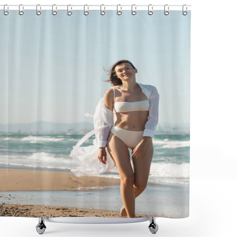 Personality  happy young woman in white shirt and swimwear walking on sea shore  shower curtains