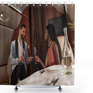 Personality  Selective Focus Of Smiling Interracial Couple Clinking Glasses Of Champagne In Private Jet Shower Curtains