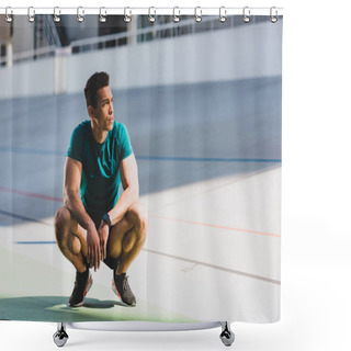 Personality  Front View Of Mixed Race Sportsman Squatting And Looking Away At Stadium In Sunlight  Shower Curtains