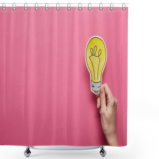 Personality  Top View Of Hand Holding Yellow Light Bulb On Pink Background Shower Curtains
