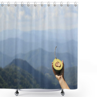 Personality  Hand Holding Avocado Half Against Mountain Landscape Shower Curtains