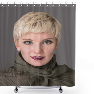 Personality  Beautiful Woman Blonde Wearing Khaki Scarf On Grey Background. Close-up Portrait. Model Shot. Fashion  Hairstyle With Fringe, Haircut And Makeup In Grey Shades. Lilac Lips. Modern Highlighting. Elegant Safari Style. Shower Curtains