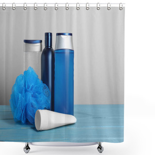 Personality  Different Shower Gel Bottles With Pouf On Turquoise Wooden Table. Space For Text Shower Curtains