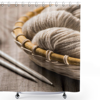 Personality  Selective Focus Of Beige Knitted Woolen Yarn In Wicker Basket Near Knitted Needles On Wooden Background  Shower Curtains