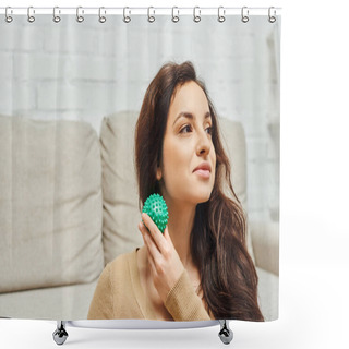 Personality  Young Brunette Woman In Jumper Holding Manual Massage Ball And Looking Away While Sitting Near Couch At Home, Home-based Massage And Holistic Wellness Practices Concept, Balancing Energy Shower Curtains