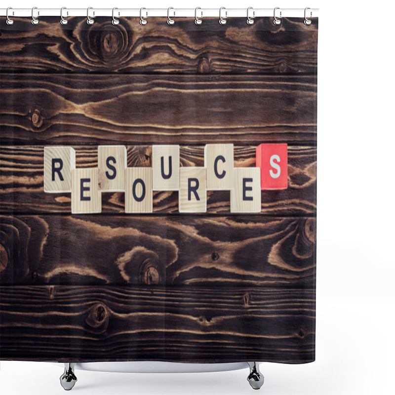 Personality  top view of wooden blocks arranged in resources word on brown wooden surface shower curtains