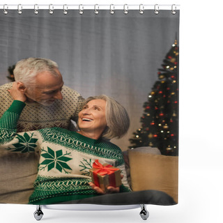 Personality  Happy Middle Aged Woman Holding Christmas Present And Hugging Husband In Sweater  Shower Curtains