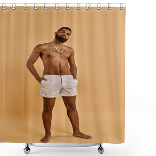 Personality  A Man With No Shirt Standing Confidently In Front Of A Tan Background, Showcasing His Muscular Physique And Sense Of Self-assurance. Shower Curtains