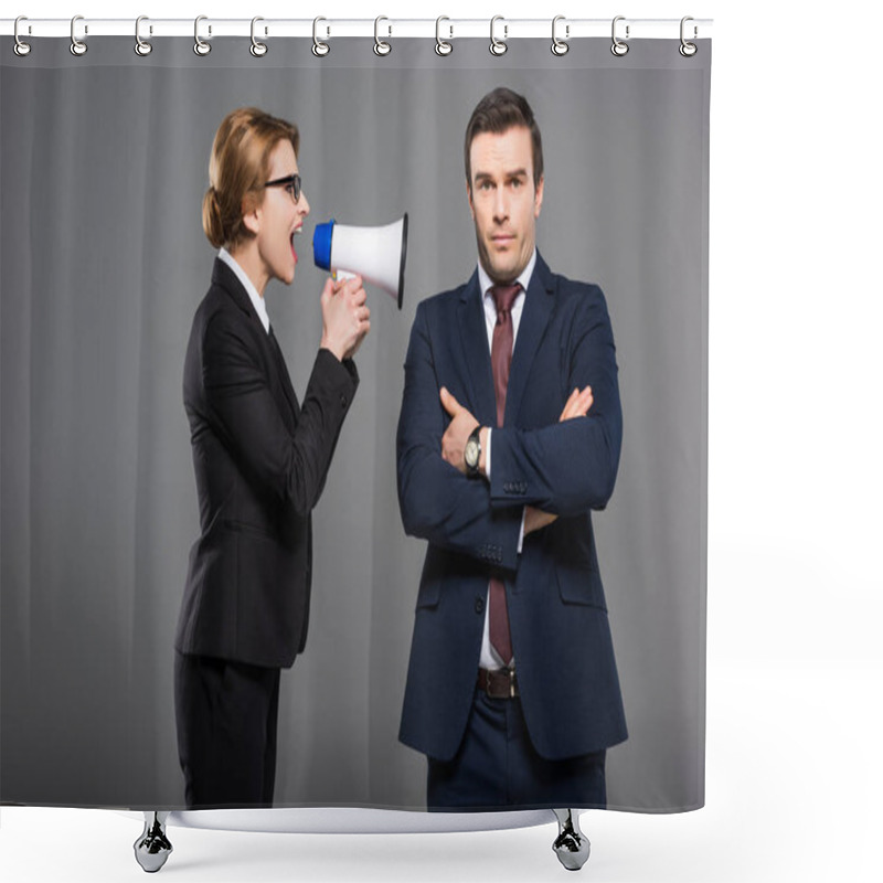 Personality  aggressive businesswoman with bullhorn yelling at businessman, isolated on grey, feminism concept shower curtains
