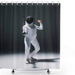 Personality  Fencer In Fencing Mask And Suit Training Under Spotlight On Black Background Shower Curtains