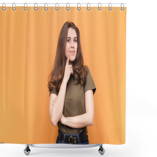 Personality  Young Pretty Woman Smiling With A Happy, Confident Expression With Hand On Chin, Wondering And Looking To The Side Against Orange Wall Shower Curtains