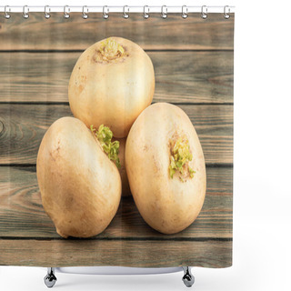 Personality  Several Yellow Turnips On A Wooden Background. Close Up. Shower Curtains