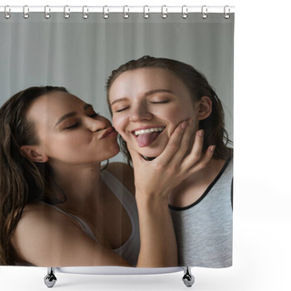Personality  Young Woman Pouting Lips And Touching Face Of Lesbian Girlfriend Sticking Out Tongue Isolated On Grey Shower Curtains