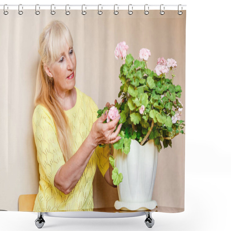 Personality  Fifty-year-old Beautiful Caucasian Woman Admires Blooming Pink Pelargonium In Pots Shower Curtains