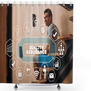 Personality  Happy Mixed Race Man Using Laptop On Stairs Near Quality Assurance Lettering And Virtual Icons  Shower Curtains
