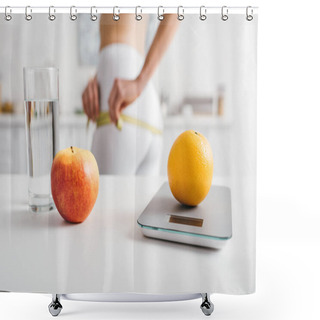 Personality  Selective Focus Of Fruits, Glass Of Water And Scales On Table Near Slim Girl Measuring Hips In Kitchen, Calorie Counting Diet Shower Curtains