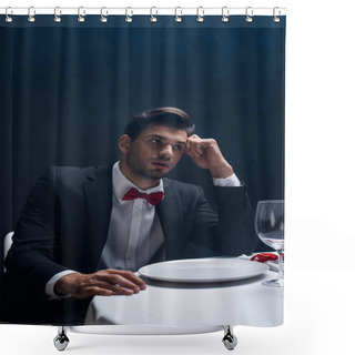 Personality  Handsome Man In Suit Looking Away At Served Table Isolated On Black Shower Curtains