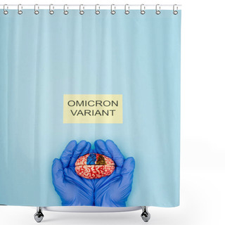 Personality  Partial View Of Scientist With Brain Model Near White Card With Omicron Variant Lettering On Blue Shower Curtains